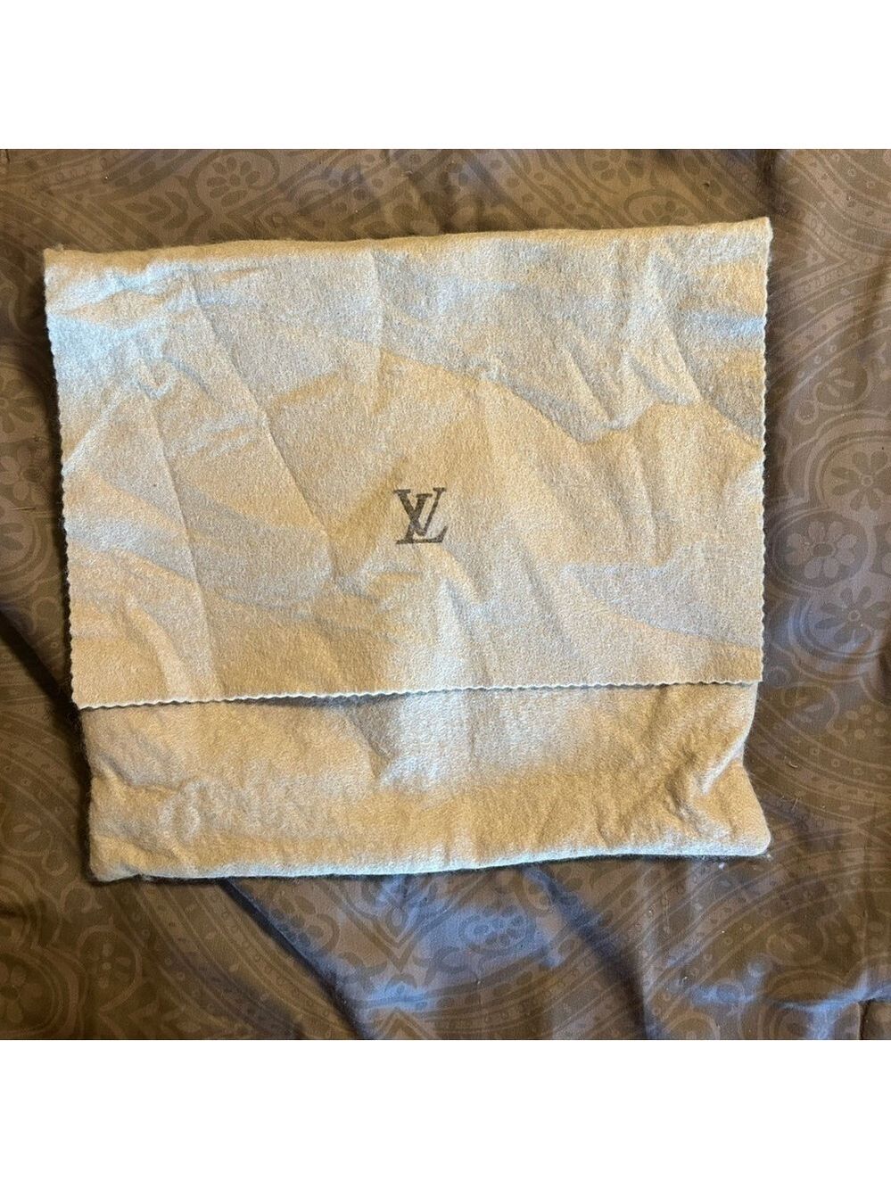 Lv dust bag fold over